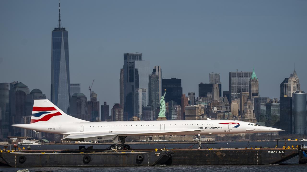 A retired British Airways Concorde is towed up the Hudson River en route to the Intrepid Museum, following its restoration. Picture: Eduardo Munoz Alvarez/Getty Images