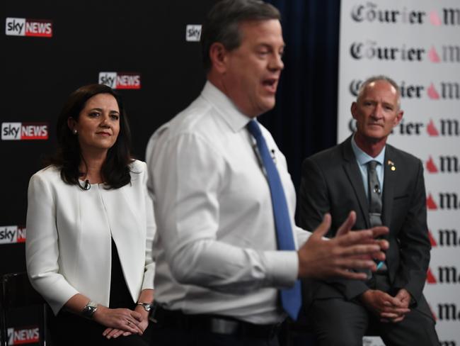 Premier Annastacia Palaszczuk and One Nation leader Steve Dickson watch as Opposition Leader Tim Nicholls addresses the audience at the Sky News-Courier-Mail People’s Forum. Picture: Dan Peled/AAP