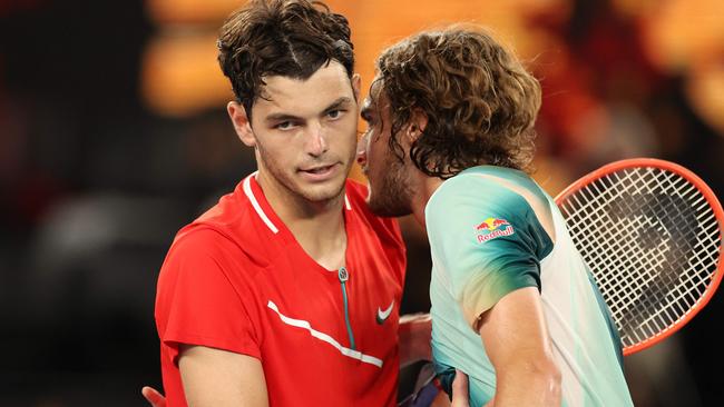 Stefanos Tsitsipas and Taylor Fritz at the net after the match. Picture: AFP Images