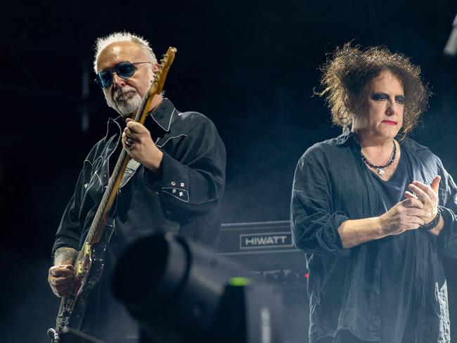 (FILES) Reeves Gabrels (L) and Robert Smith of British rock band The Cure perform at the Austin City Limits (ACL) Music Festival on October 12, 2019 at Zilker Park in Austin, Texas. Legendary dark rock band The Cure will release their first studio album in 16 years on Friday, November 1, sparking excitement among their legions of fans and early critical praise. (Photo by SUZANNE CORDEIRO / AFP)