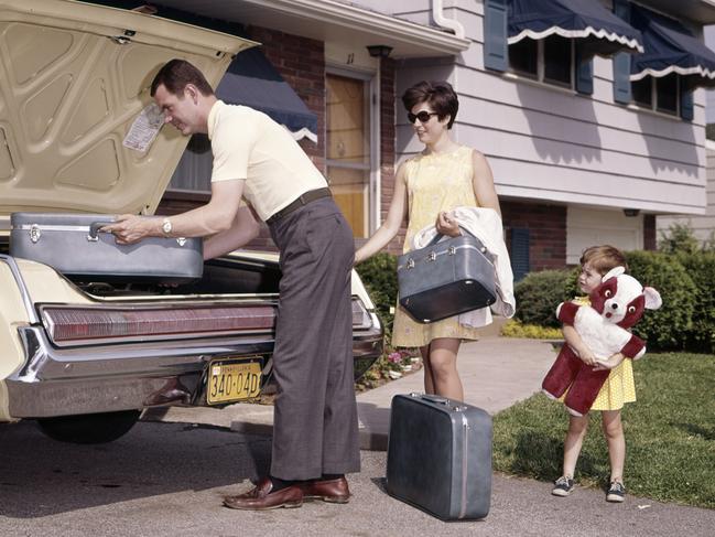 Getting ready to hit the road. with matching luggage and teddy bear. Picture: Getty Images