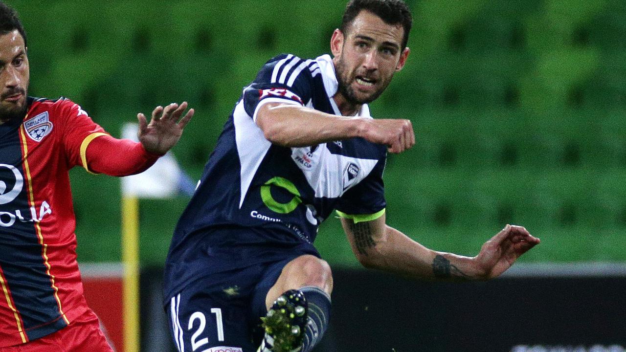 FFA Cup Quarter finals at AAMI Park, Melbourne Victory V Adeliade United 22nd September, Melbourne Australia. Adelaide United's Sergio Cirio and Melbourne Victory's Carl Valeri Picture : George Salpigtidis