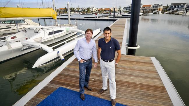 Sam Sgherza with Crown Marina manager Michael Macolino (right) in North Haven. Picture: Russell Millard