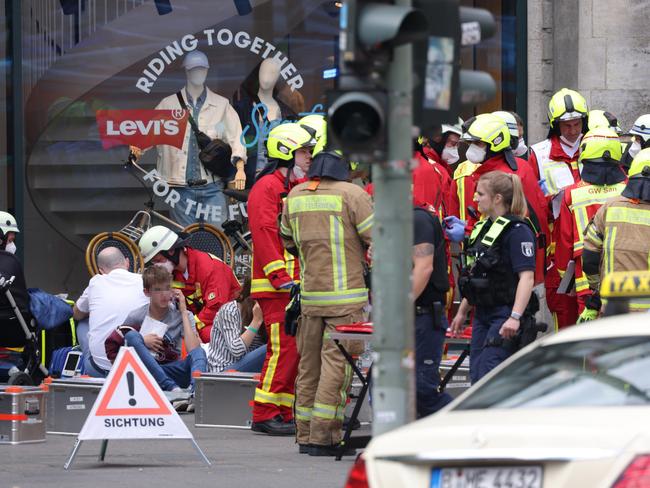 Emergency responders tend to the injured after a car ploughed into pedestrians on Kurfuerstendamm avenue on June 08, 2022 in Berlin, Germany. Picture: Sean Gallup/Getty Images.