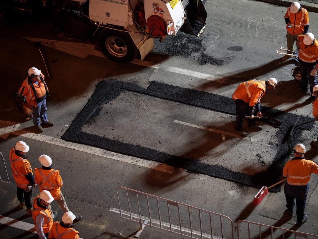 Mike Parr art installation for Dark Mofo: He his buried under Macquarie St Hobart. Picture: DARK MOFO