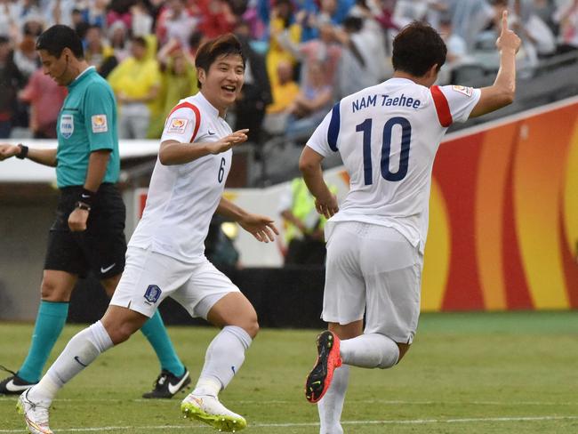 Nam Tae-Hee celebrates his goal.