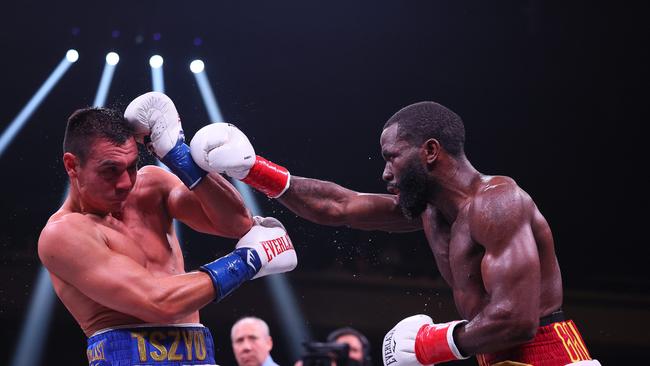 Tszyu will have to work on that defence. Photo: Adam Bettcher/Getty Images/AFP