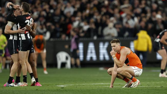 Harry Himmelberg on the final siren as the Pies celebrate. Photo by Phil Hillyard