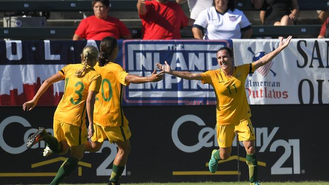 Australia's Lisa De Vanna, right, celebrates with teammates Temeka Butt, left, and Sam Kerr.