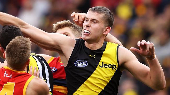 SYDNEY, AUSTRALIA - MAY 30: Callum Coleman-Jones of the Tigers spoils during the round 11 AFL match between the Richmond Tigers and the Adelaide Crows at GIANTS Stadium on May 30, 2021 in Sydney, Australia. (Photo by Mark Kolbe/AFL Photos/via Getty Images)