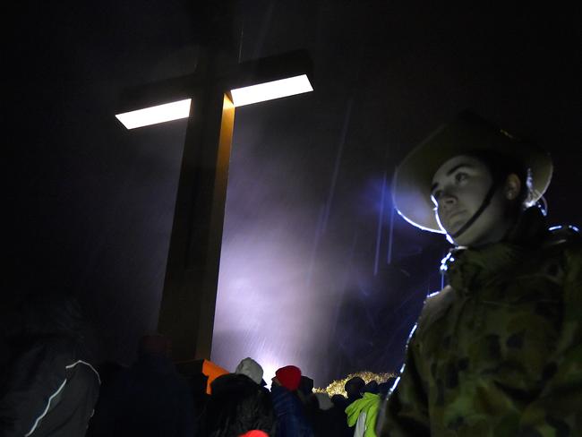 Solemn occasion ... Anzac dawn service at Mt Macedon Memorial Cross. Picture: Jay Town.