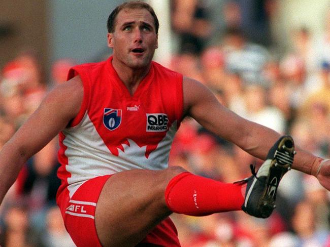 Aust footballer Tony Lockett kicking ball. AFL football - Sydney Swans vs West Coast Eagles match at the SCG. a/ct /Football/AFL