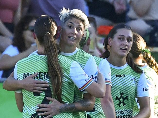 BRISBANE, AUSTRALIA - MARCH 30: Michelle Heyman and team mates celebrate a goal during the A-League Women round 22 match between Brisbane Roar and Canberra United at Perry Park, on March 30, 2024, in Brisbane, Australia. (Photo by Jono Searle/Getty Images)