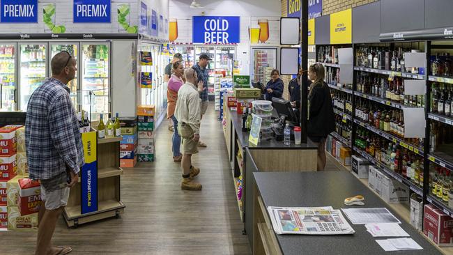 Inside, the simple act of buying beer has been significantly slowed. Picture: Jon Gellweiler/news.com.au