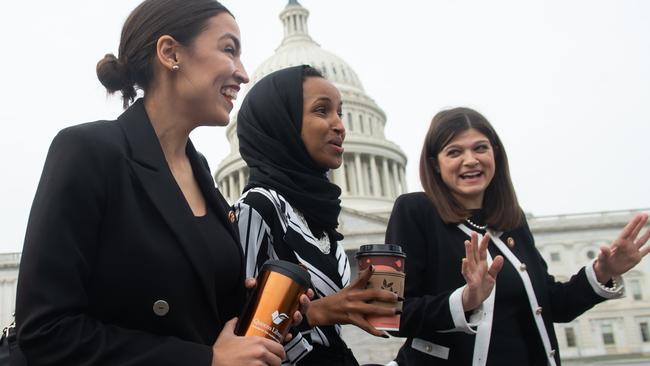 Alexandria Ocasio-Cortez and Ilhan Omar with fellow Democrat Haley Stevens. Picture: AFP.