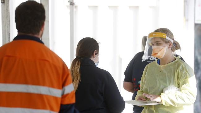 The Covid-19 testing line at Campbelltown Hospital, in another of the local government areas subject to tighter lockdown conditions from midnight. Picture: Jonathan Ng