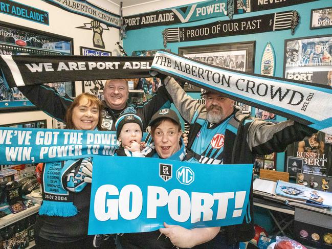 September 9, 2024: Natalie Shelley, and David Shelley Mike and Monique Brown with son Angus (1) are Port Adelaide supporters going to Sydney on FridayPicture: Kelly Barnes