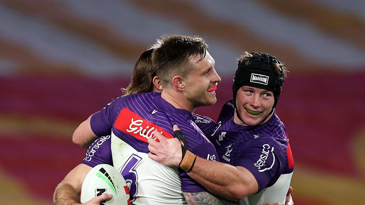 SYDNEY, AUSTRALIA - AUGUST 08: Ryan Papenhuyzen of the Storm celebrates scoring a try during the round 23 NRL match between South Sydney Rabbitohs and Melbourne Storm at Accor Stadium, on August 08, 2024, in Sydney, Australia. (Photo by Brendon Thorne/Getty Images)