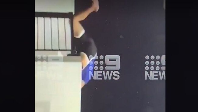 A man falling from a balcony during a dramatic arrest in Surfers Paradise. Picture: 9 News Gold Coast