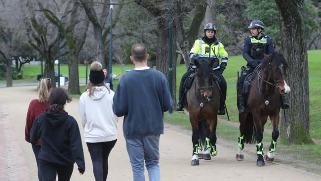 Police one horseback keep an eye on people exercising on the Tan track. Picture: David Crosling/NCA NewsWire.