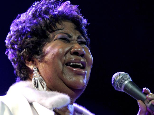 FILE - In this Nov. 21, 2008 file photo, Aretha Franklin performs at the House of Blues in Los Angeles.   Franklin died Thursday, Aug. 16, 2018 at her home in Detroit.  She was 76.  (AP Photo/Shea Walsh, file)