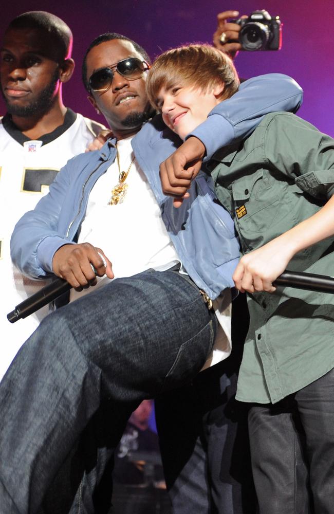 2010: Bieber, then only 16, and just starting to experience fame for his first hit single ‘Baby’ - he joined Diddy and Chris Brown on stage at the BET Help for Haiti Benefit in 2010. This was six months after Brown plead guilty to assaulting ex-girlfriend Rihanna. Picture: Larry Marano/Getty Images