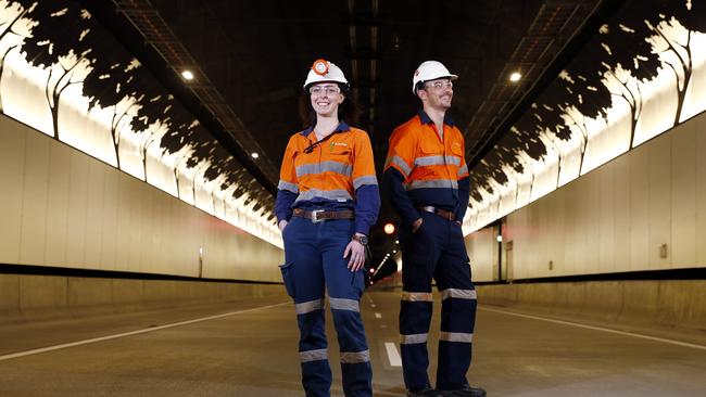 NorthConnex workers (from left) Emma Clark and Timothy Nairne inside the completed tunnel. Picture: Sam Ruttyn