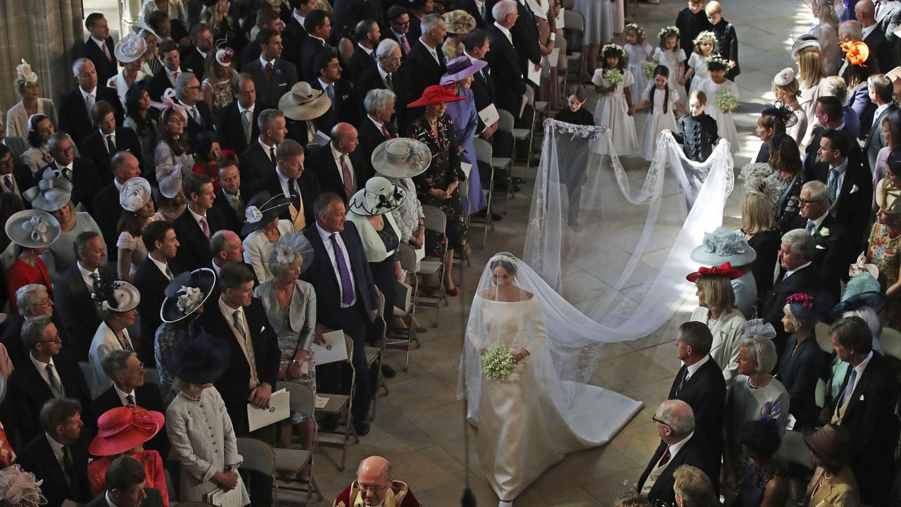 Meghan Markle walks down the aisle. Picture: AP