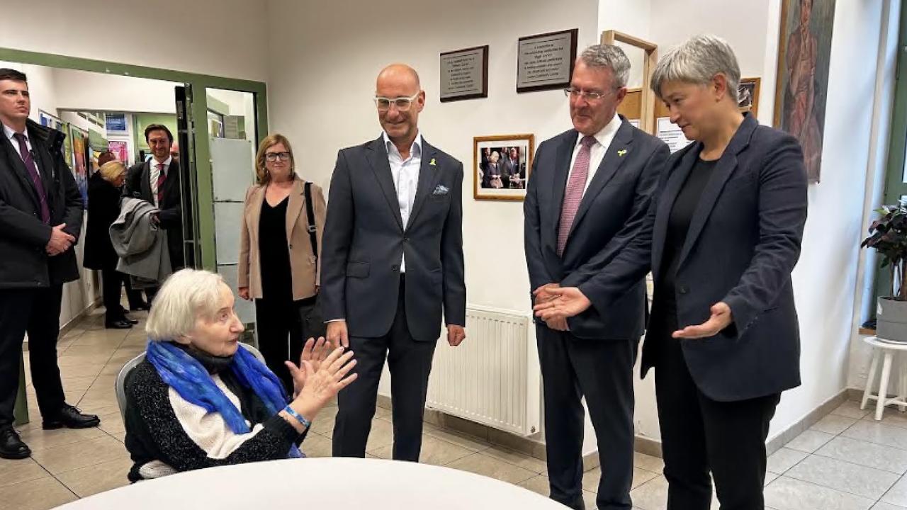 Holocaust survivor Zofia Radzikowska, 89, Jewish Community Centre of Krakow's executive director Jonathan Ornstein, Attorney-General Mark Dreyfus and Foreign Minister Penny Wong in Poland ahead of the 80th anniversary of the commemoration of the liberation of Auschwitz. Picture: Sophie Elsworth