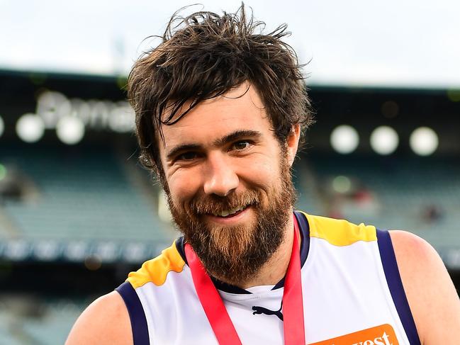 PERTH, AUSTRALIA - AUGUST 07: Josh Kennedy of the Eagles with his Ross Glendinning Medal during the 2016 AFL Round 20 match between the Fremantle Dockers and the West Coast Eagles at Domain Stadium on August 07, 2016 in Perth, Australia. (Photo by Daniel Carson/AFL Media/Getty Images)