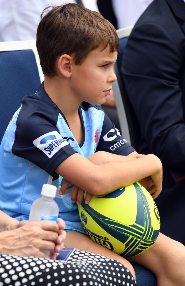 Dan Vickerman's eldest son, Joseph, wearing a NSW Waratahs shirt like his brother. Picture: AAP Image/Paul Miller