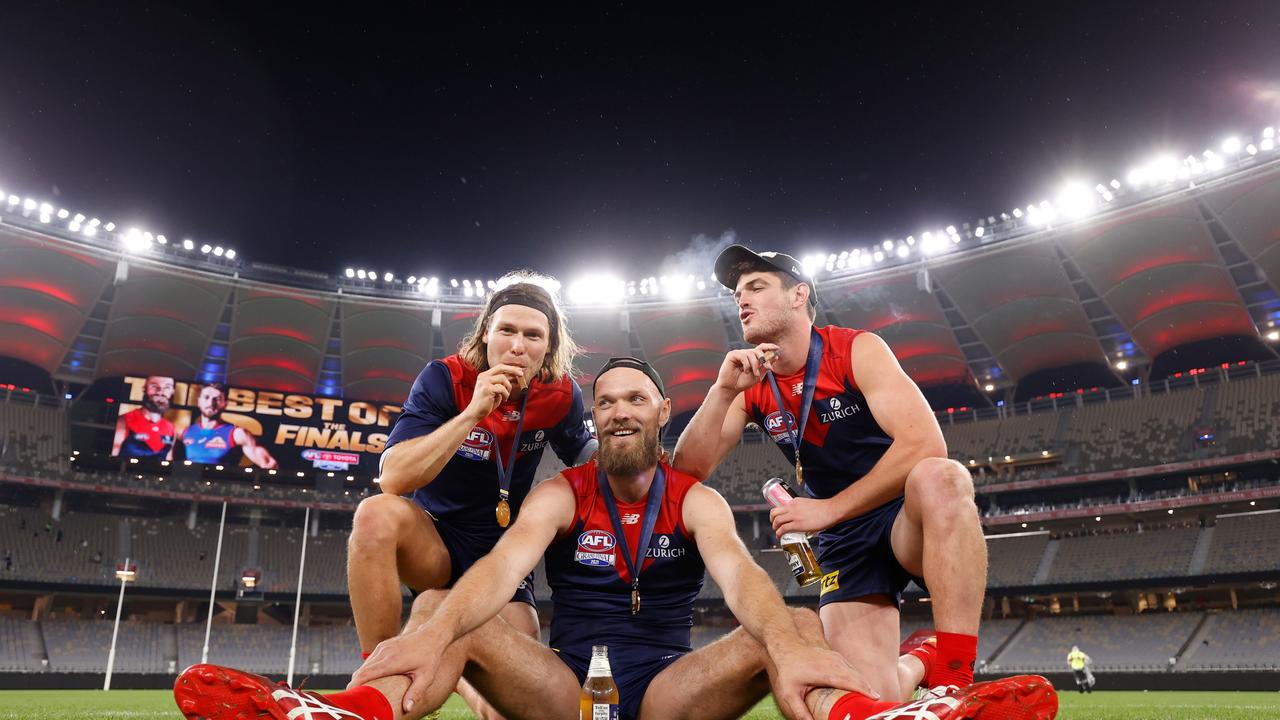 The iconic photo of Ed Langdon, Max Gawn and Angus Brayshaw after Melbourne’s premiership in Perth in 2021. Picture: Michael Wilson/AFL Photos via Getty Images.