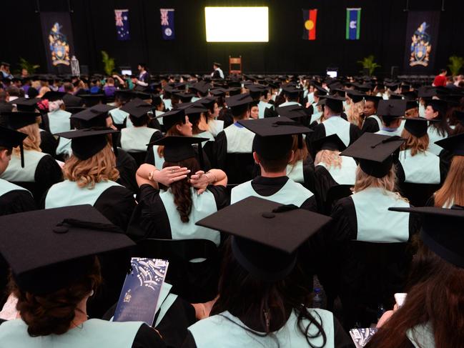 Graduates settle in to their seats at the CQ University graduation Ceremony in Rockhampton.