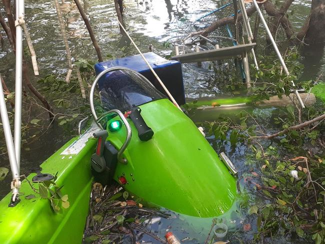 Jayden Stockbridge's boat, half submerged at Middle Arm. Picture: Jayden Stockbridge.