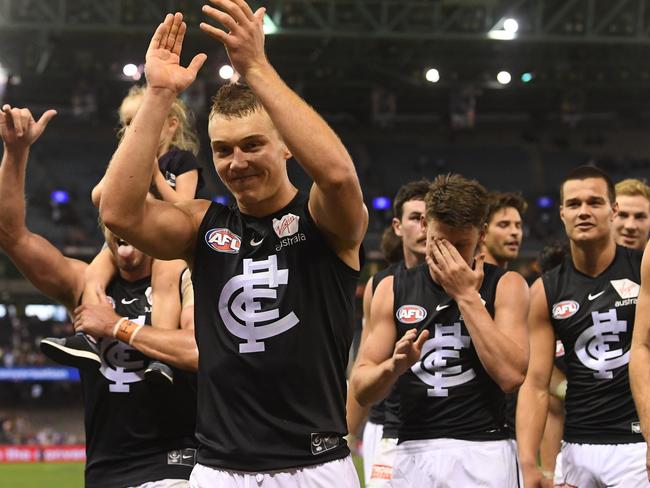 Patrick Cripps applauds fans as the Blues get on the board for the first time this year.