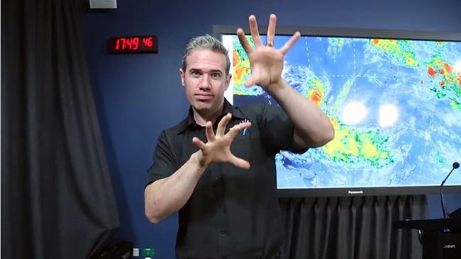 Cyclone Marcia's very own 'Sign Guy'