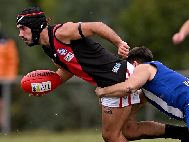 BraybrookÃs Nicholas Papakalodoukas and AlbanvaleÃs Bobby Saric during the WRFL Albanvale v Braybrook football match in Deer Park, Saturday, April 30, 2022. Picture: Andy Brownbill