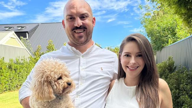 Stacey Lee has announced she is is pregnant. Picture with her husband Ben Millar and their dog Murray. Picture: Supplied