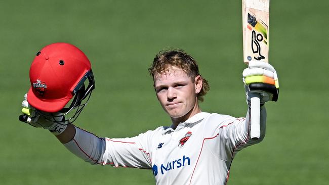 Rooster in red: Jake Fraser-McGurk celebrates after bringing up his century against Victoria in November 2023. Picture: Mark Brake/Getty Images.