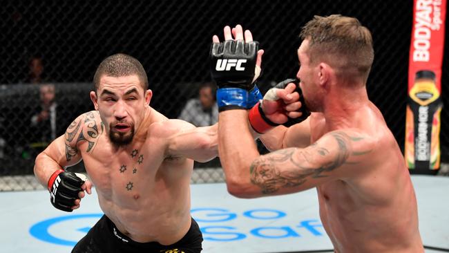 Robert Whittaker lands on his way to beating Englishman Darren Till