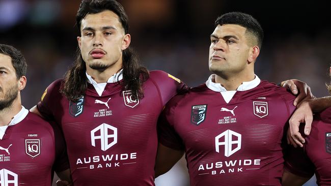 ADELAIDE, AUSTRALIA - MAY 31: Ben Hunt, Tino Fa'asuamaleaui, David Fifita and Reuben Cotter of the Maroons  stand together for the national anthem before game one of the 2023 State of Origin series between the Queensland Maroons and New South Wales Blues at Adelaide Oval on May 31, 2023 in Adelaide, Australia. (Photo by Mark Kolbe/Getty Images)