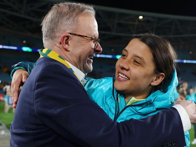 SYDNEY, AUSTRALIA - JULY 20: Sam Kerr of Australia and Anthony Albanese, Prime Minister of Australia, hug after the FIFA Women's World Cup Australia & New Zealand 2023 Group B match between Australia and Ireland at Stadium Australia on July 20, 2023 in Sydney / Gadigal , Australia. (Photo by Mark Metcalfe - FIFA/FIFA via Getty Images)