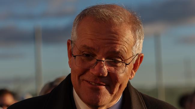 Australian Prime Minister Scott Morrison speaks to locals on May 19, 2022 at the Whitemore Tennis Club in Northern Lyons in Tasmania, Australia. Picture: Asanka Ratnayake