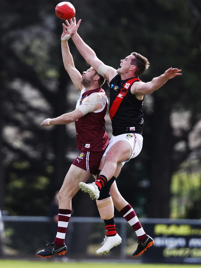 North Launceston's Alexander Lee won the hit out battle against Ryan Bailey, but the Clarence big man picked up the three Lynch Medal votes despite the Roos narrow defeat. Picture: Zak Simmonds