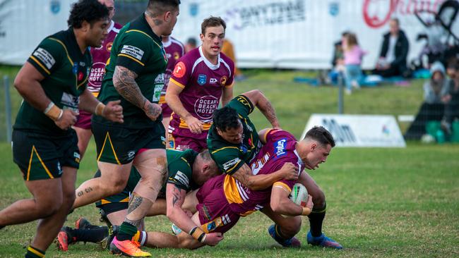 Shellharbour Stingrays Vs Sharks. Jacob Seabrook with a big charge though the line. Picture Thomas Lisson