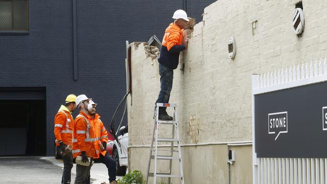 Workers carrying out the demolition in May 2020. Picture: John Appleyard