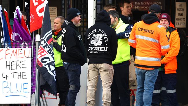 CFMEU members pictured blocking Cross River Rail workers from entering the Roma Street station worksite in Brisbane. Picture: David Clark