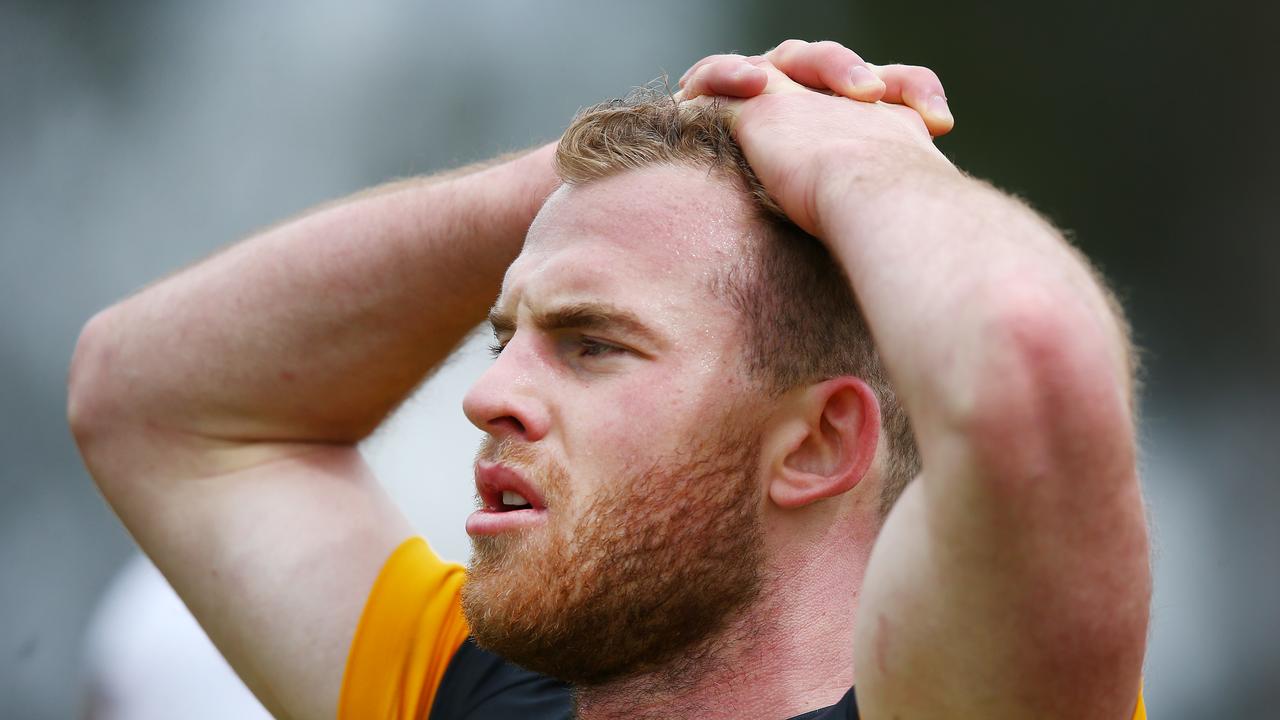 MELBOURNE, AUSTRALIA - DECEMBER 03: Tom Mitchell of the Hawks recovers after a sprint during a Hawthorn Hawks AFL training session at Xavier College on December 03, 2018 in Melbourne, Australia. (Photo by Michael Dodge/Getty Images)