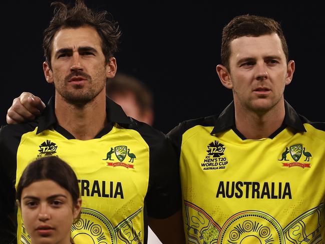 PERTH, AUSTRALIA - OCTOBER 25: Matthew Wade, Ashton Agar, Mitchell Starc and Josh Hazlewood of Australia sing the national anthem during the ICC Men's T20 World Cup match between Australia and Sri Lanka at Perth Stadium on October 25, 2022 in Perth, Australia. (Photo by Paul Kane/Getty Images)