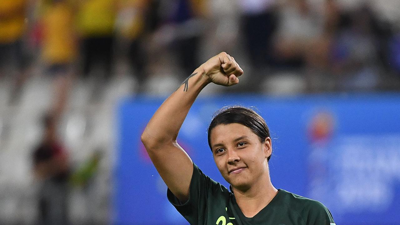 Australia's forward Samantha Kerr celebrates after her historic haul